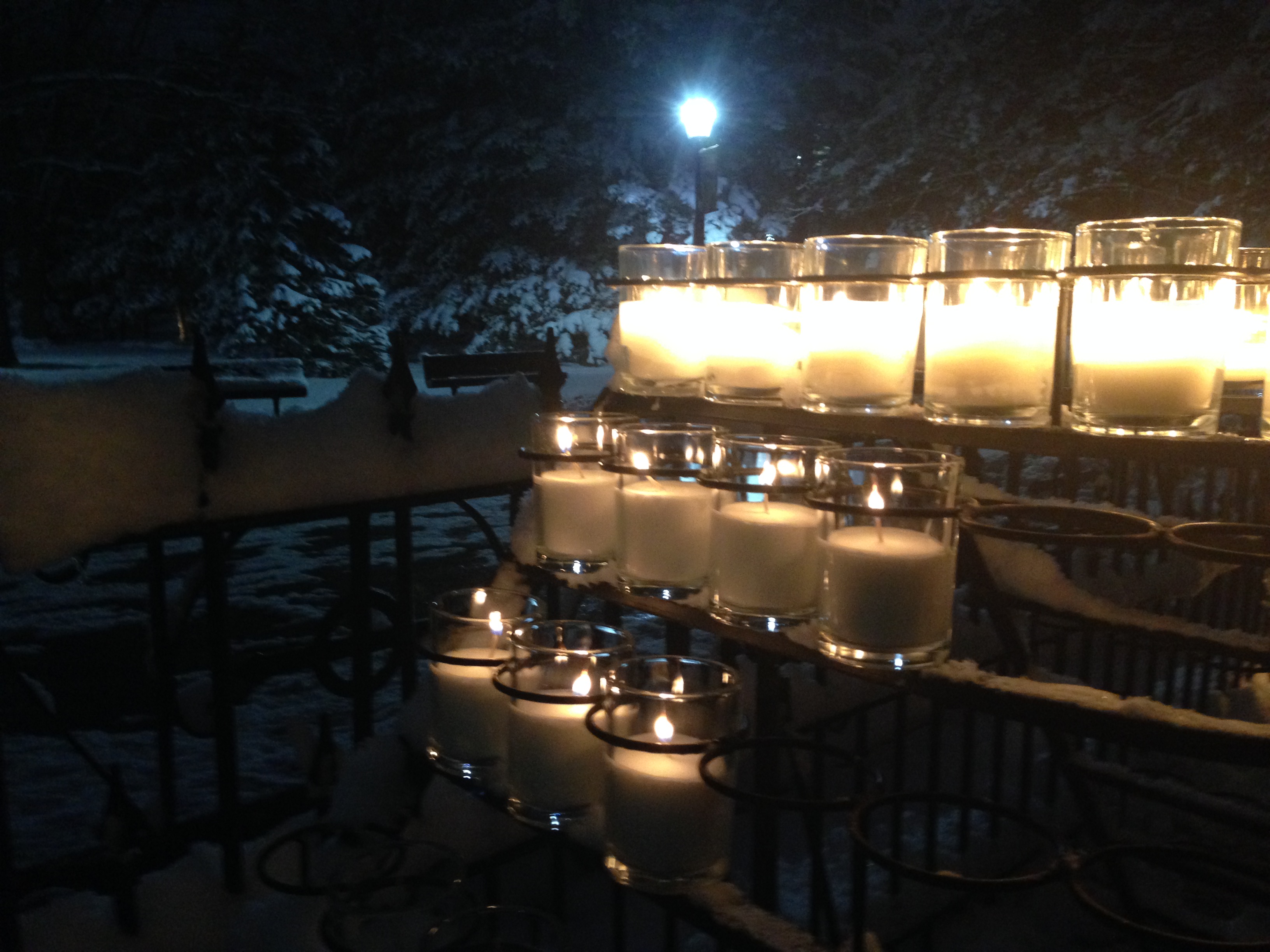 candles lit at the grotto this week for family and friends